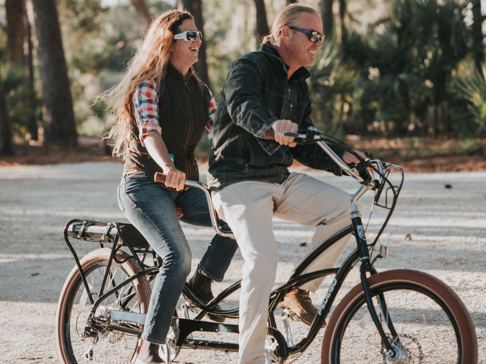 a person riding on the back of a bicycle