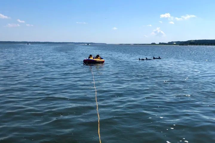 a small boat in a large body of water