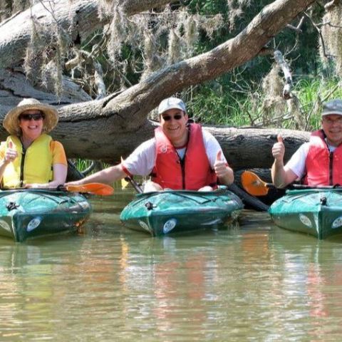 Group-1 3 people on 3 kayaks in the water