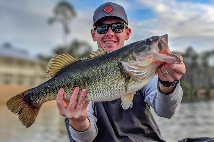 a man holding a fish