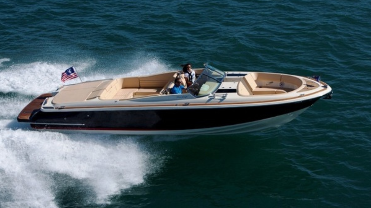 17319478533889-Solaris-1 a group of people riding on the back of a boat in the water